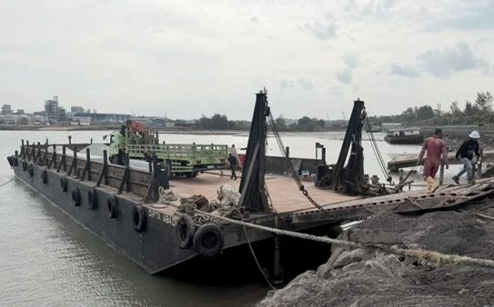 A barge alongside during operational activity